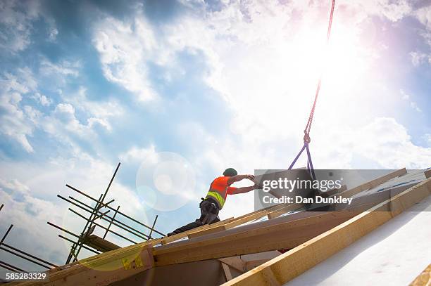 worker on construction site - housing estate stock pictures, royalty-free photos & images