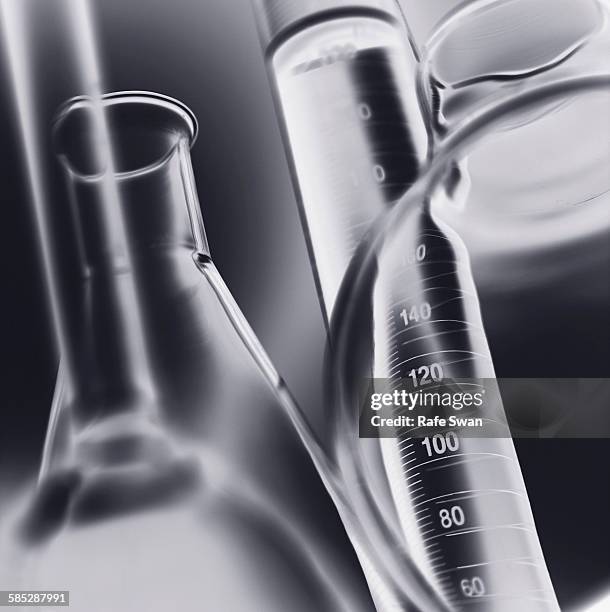 volumetric laboratory glassware used in a chemistry lab, close-up - pallone di vetro foto e immagini stock