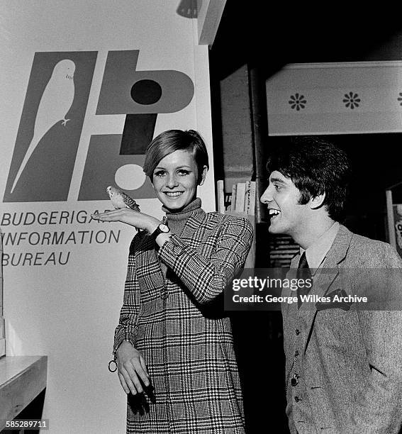 English model and actress Lesley Lawson, aka Twiggy, with her manager Justin de Villeneuve at the Budgerigar Information Bureau in London.