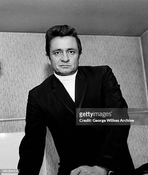 American country music singer, songwriter and guitarist Johnny Cash .