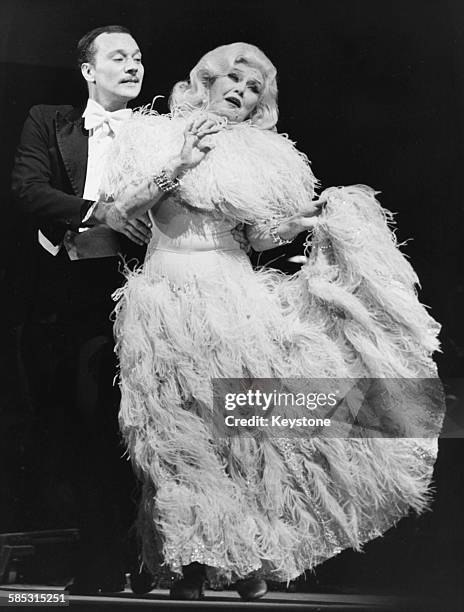 Dancer Ginger Rogers singing and dancing on stage during her new show, at the Olympia Music Hall in Paris, circa 1980.