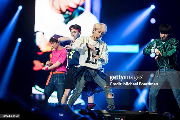 Musical group Shinee perform at KCON LA 2016 at L.A. LIVE on July 30, 2016 in Los Angeles, California.