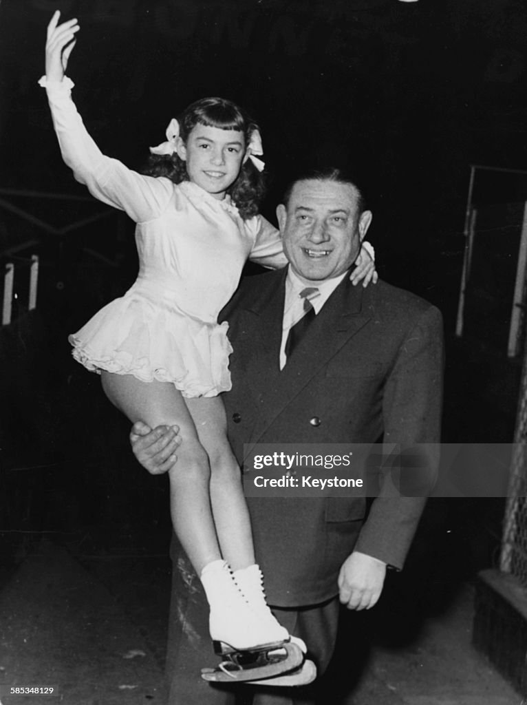 Charles Rigolot French Olympic weight lifter Charles Rigoulot holding up his young ...