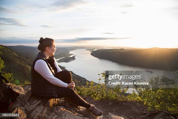 woman enjoying view on hill, angels rest, columbia river gorge, oregon, usa - columbia river gorge stock pictures, royalty-free photos & images