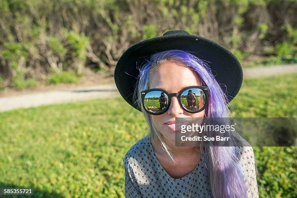 woman with sun glasses and hat, el capitan, california, usa - dyed shades imagens e fotografias de stock