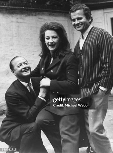 Portrait of playwright Terence Rattigan with actors Zoe Caldwell and Ian Holm, at a photocall for their new play 'A Bequest to the Nation', which...