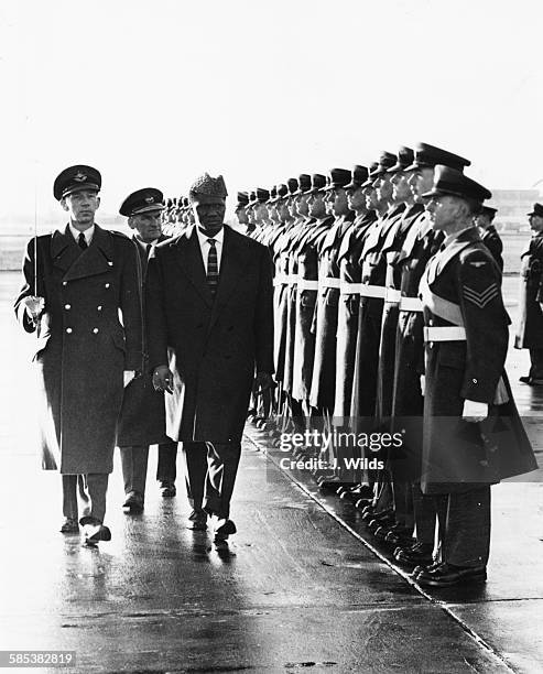 Ahmed Sekou Toure , the President of Guinea, inspects a Guard of Honor after arriving at London Airport, November 10th 1959.