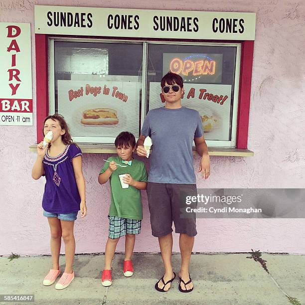 pink ice cream shop - embarrased dad stock pictures, royalty-free photos & images