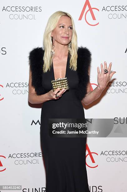 Designer Jennifer Fisher poses with award during the Accessories Council 20th Anniversary celebration of the ACE awards at Cipriani 42nd Street on...