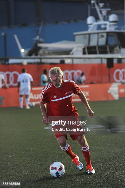 Former FC Bayern Munich footballer Paul Breitner plays during the Audi Player Index Pick-Up Match at Chelsea Piers on August 2, 2016 in New York City.