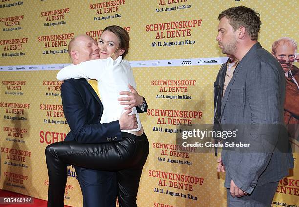 Simon Schwarz, Lisa Maria Potthoff and Sebastian Bezzel during the premiere of the film 'Schweinskopf al dente' at Mathaeser Filmpalast on August 2,...