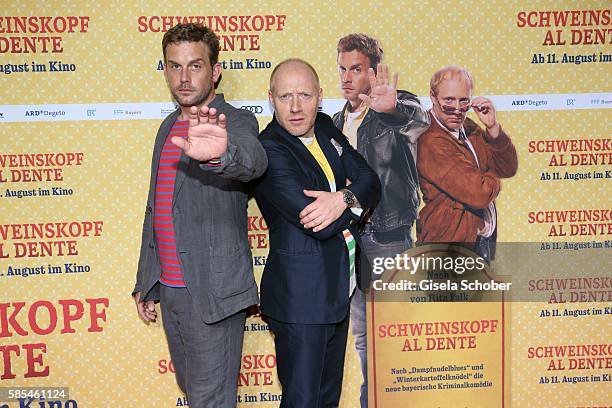 Sebastian Bezzel and Simon Schwarz during the premiere of the film 'Schweinskopf al dente' at Mathaeser Filmpalast on August 2, 2016 in Munich,...