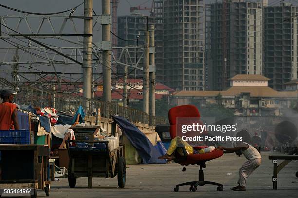 Peoples doing their activities in the one of slums area in Jakarta. According to the data that released by Jakarta Central Statistic Agency on August...