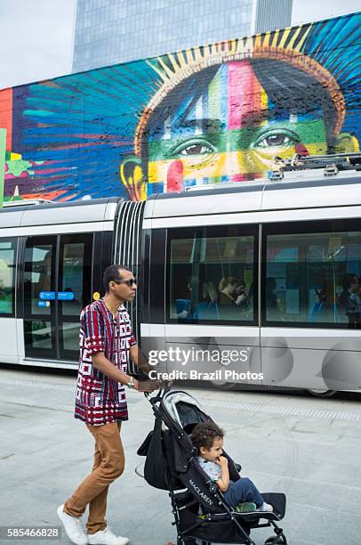 Rio de Janeiro Light Rail , a light rail system opened in June 2016 ahead of the 2016 Olympic Games passes in front of Eduardo Kobra s Mural named...