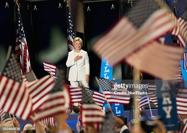 Democratic presidential candidate Hillary Clinton stands on the stage after accepting the party's nomination on the final day of the Democratic...