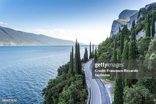 gardesana scenic route, lake garda - lombard stock pictures, royalty-free photos & images