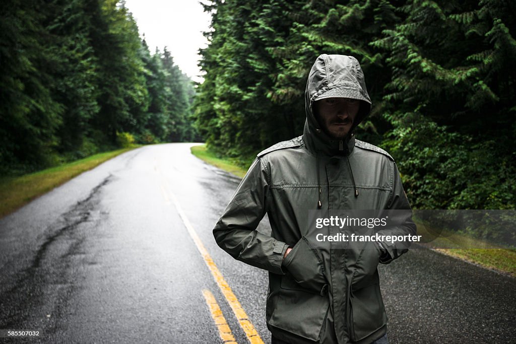 Solitude man walking on the street in British columbia