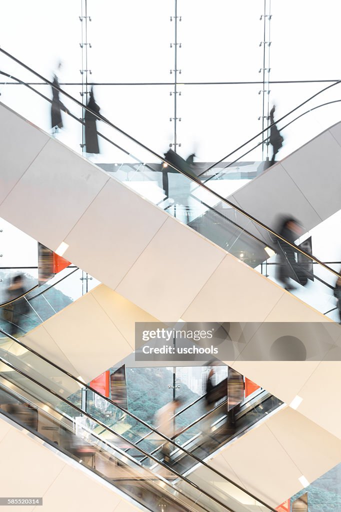 Modern Escalator with blurred people