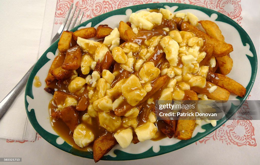 Poutine Small Poutine High-Res Stock Photo - Getty Images