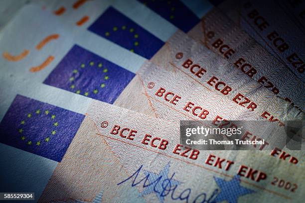 Berlin, Germany In this Photo Illustration the abbreviations for the European Central Bank can be seen on euro banknotes on August 03, 2016 in...