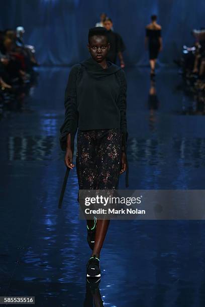 Model showcases designs by Strateus Carlucci on the runway at the David Jones Spring/Summer 2016 Fashion Launch at Fox Studios on August 3, 2016 in...