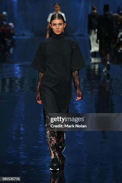 Model showcases designs by Strateus Carlucci on the runway at the David Jones Spring/Summer 2016 Fashion Launch at Fox Studios on August 3, 2016 in...