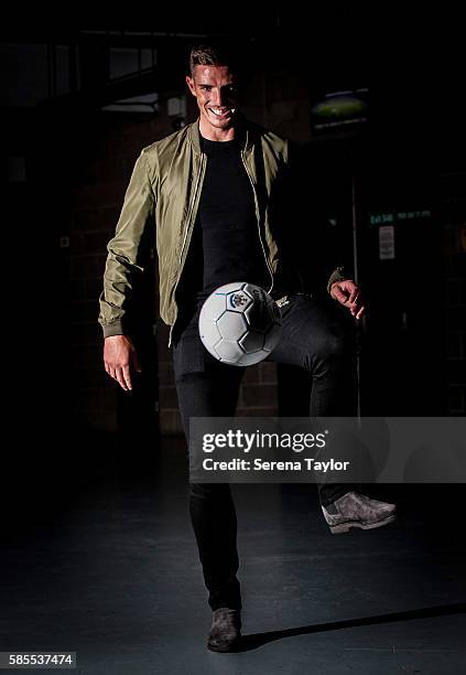 Ciaran Clark plays keeping up for photographs with a newcastle ball at St.James' Park on August 2 in Newcastle upon Tyne, England.