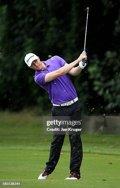 Rory Tinker of Piperdam Golf & Leisure Resort plays an approach shot during day one of the PGA Assistants Championships at Little Aston Golf Club on...