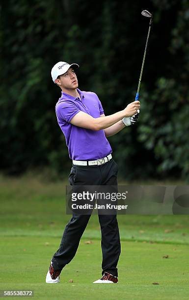 Rory Tinker of Piperdam Golf & Leisure Resort plays an approach shot during day one of the PGA Assistants Championships at Little Aston Golf Club on...