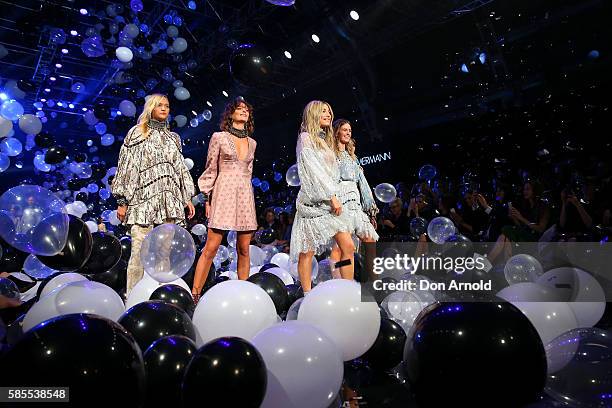 Jessica Gomes and models showcase designs by Zimmerman on the runway at the David Jones Spring/Summer 2016 Fashion Launch at Fox Studios on August 3,...