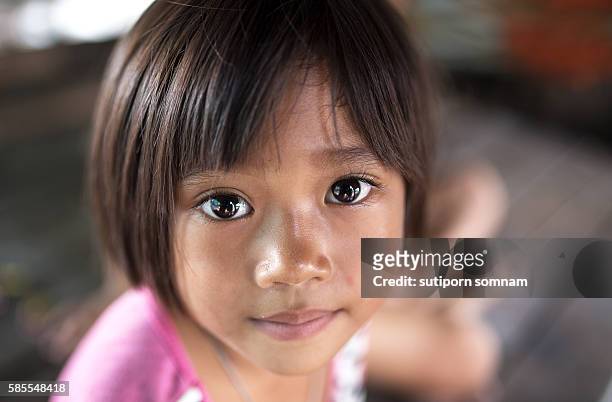 eyes of hope - filipino girl stockfoto's en -beelden