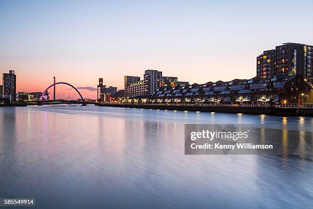 a river flowing through a city at sunset - williamson county stock pictures, royalty-free photos & images