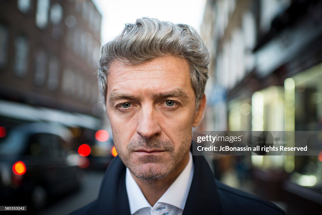 Serious Business man street portrait