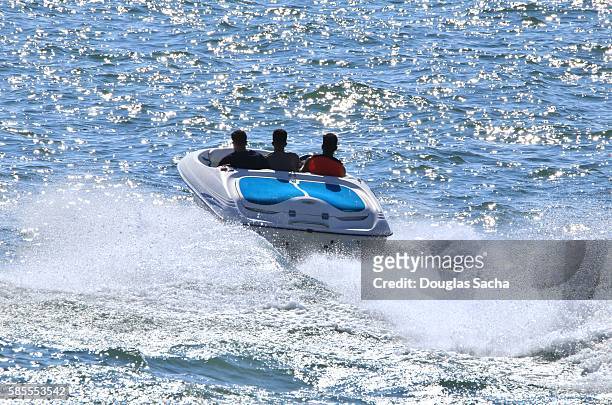 speed boat making wake in on the water - motorboating ストックフォトと画像