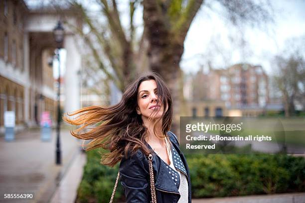 beautiful woman waving - jc bonassin stock pictures, royalty-free photos & images