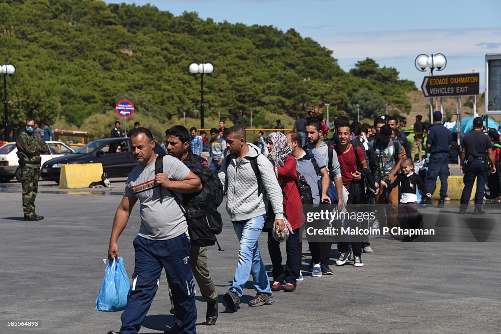 Refugees board ferry from Lesvos, Greece