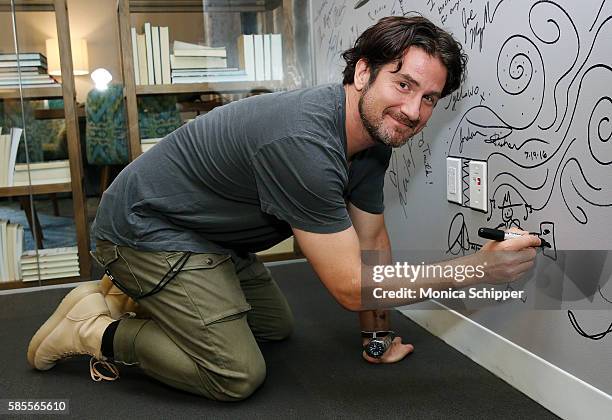 Singer-songwriter Matt Nathanson signs the wall at AOL HQ when he visits for AOL Build Speaker Series - Matt Nathanson, "Show Me Your Fangs" at AOL...