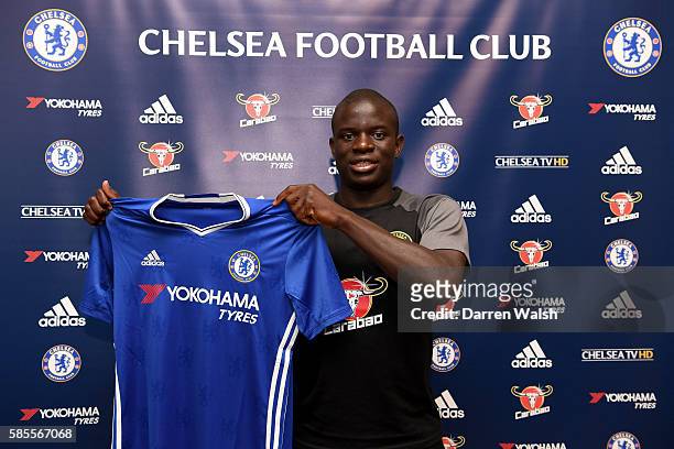 Chelsea's new signing N'Golo Kante poses for a photo with the club shirt during the club's pre-season US tour at Loews Hotel on August 3, 2016 in...