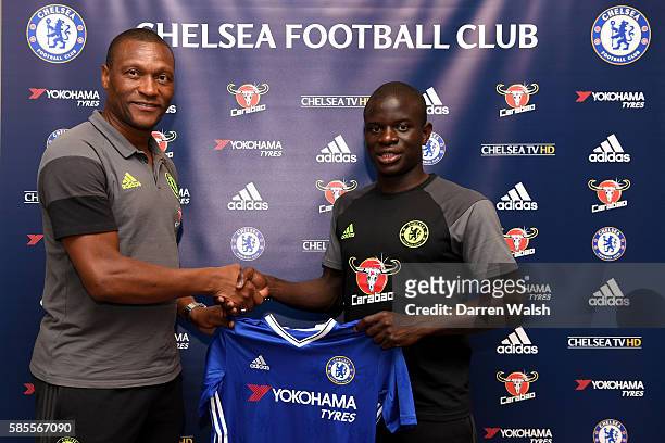 Chelsea's new signing N'Golo Kante poses for a photo with technical director Michael Emenalo during the club's pre-season US tour at Loews Hotel on...