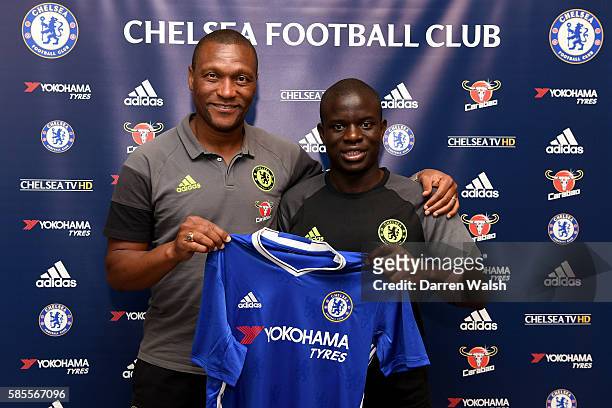 Chelsea's new signing N'Golo Kante poses for a photo with technical director Michael Emenalo during the club's pre-season US tour at Loews Hotel on...