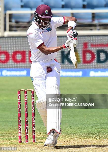 Roston Chase of the West Indies swings and misses connecting on this a delivery from bowler Ishant Sharma of India on day five of their Second Test...