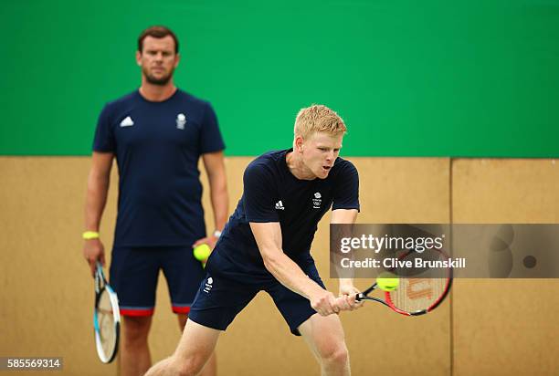 Team GB coach Leon Smith watches Kyle Edmund of Great Britain during a practice session ahead of the Rio 2016 Olympic Games at the Olympic Tennis...