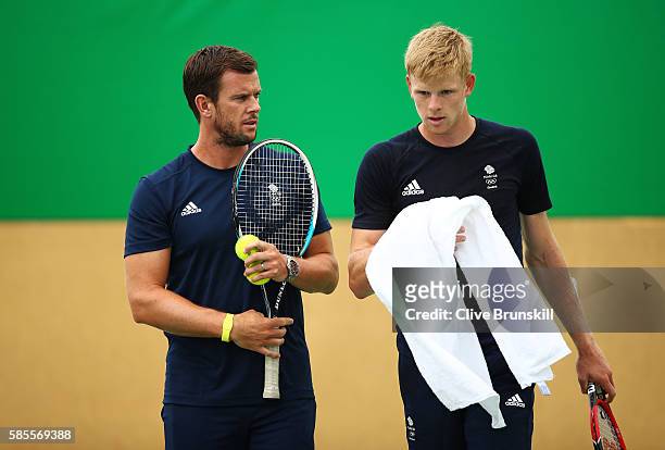 Team GB coach Leon Smith and Kyle Edmund of Great Britain during a practice session ahead of the Rio 2016 Olympic Games at the Olympic Tennis Centre...