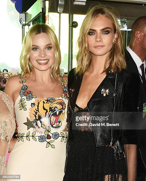 Margot Robbie and Cara Delevingne attend the European Premiere of "Suicide Squad" at Odeon Leicester Square on August 3, 2016 in London, England.