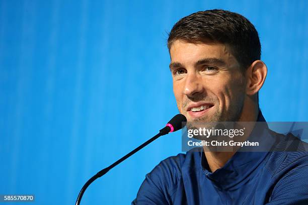 Michael Phelps of the United States speaks with the media during a press conference at the Main Press Centre ahead of the Rio 2016 Olympic Games on...