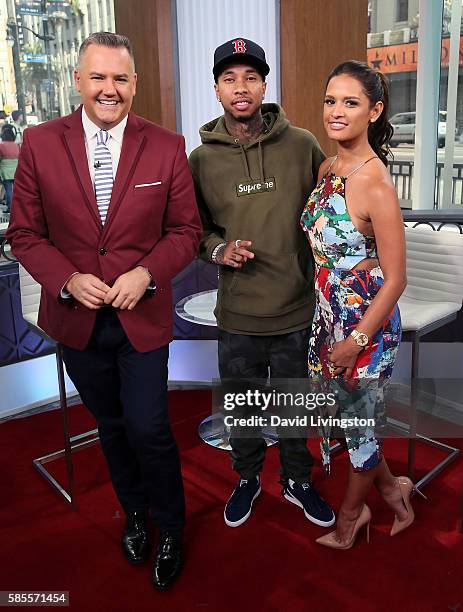 Host Ross Mathews, rapper Tyga and TV personality Rocsi Diaz pose at Hollywood Today Live at W Hollywood on August 3, 2016 in Hollywood, California.