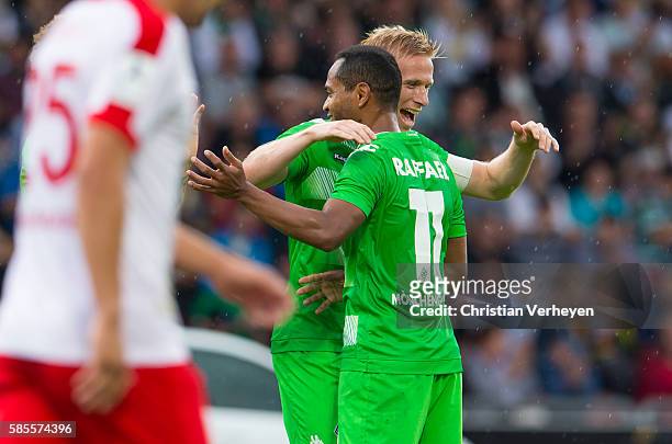 Oscar Wendt and Raffael of Borussia Moenchengladbach celebrate after their third goal during a friendly match between KSV Hessen Kassel and Borussia...
