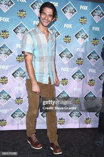 Tyler Posey poses at the Teen Choice Awards 2016 at The Forum on July 31, 2016 in Inglewood, California.