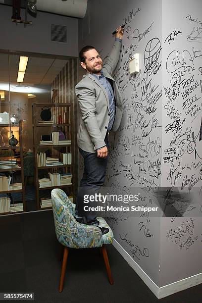 Personality and producer Jack Osbourne signs the wall at AOL HQ when he visits for AOL Build Speaker Series - Jack Osbourne, "Ozzy & Jack"s World...