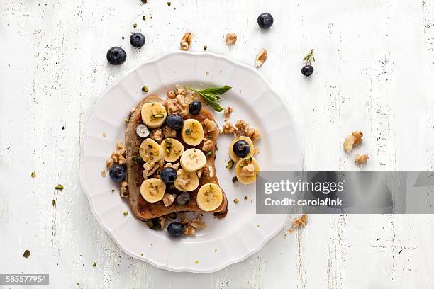 french toast with bananas - blaubeeren stock pictures, royalty-free photos & images